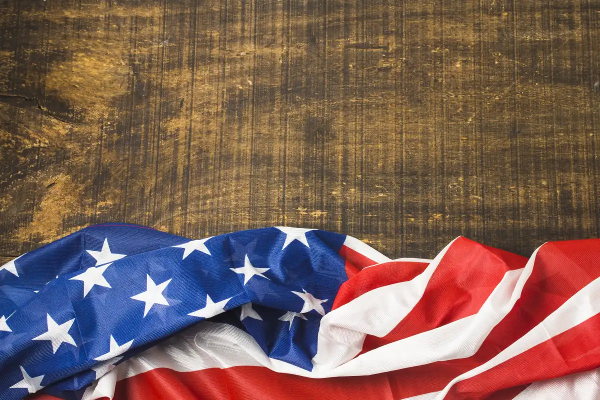 Wooden background with USA flag showing immigration news